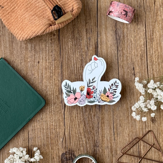 Sticker "poing en fleurs"